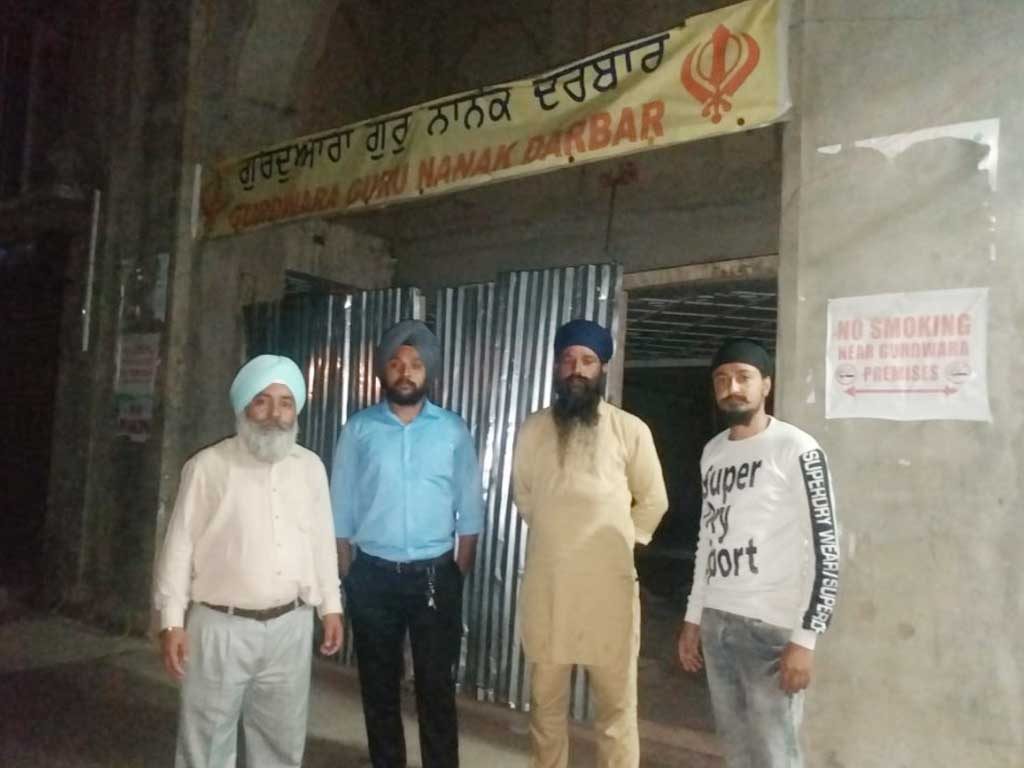 Shillong Sikhs outside their Gurdwara Under construction