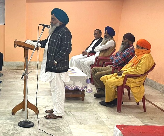 Community Leaders addressing the meeting of Harijan Colony