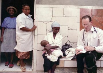 Paul Farmer with patients in Africa