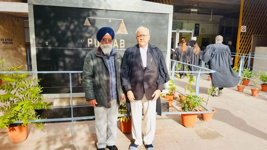 Baldev Singh with his lawyer at the Punjab and Haryana High Court