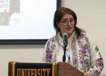 Dr Komal Singh speaking at University of California